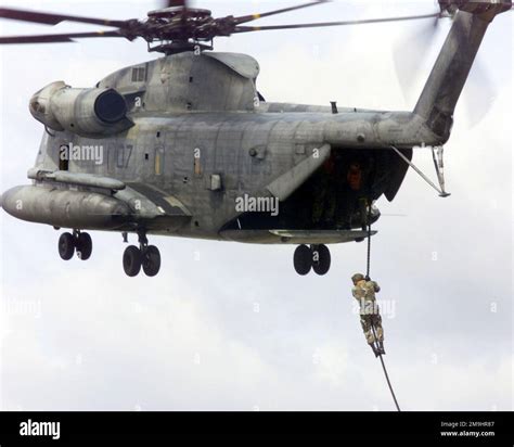 USMC personnel assigned to the 1ST Battalion, 3rd Marines fast rope ...