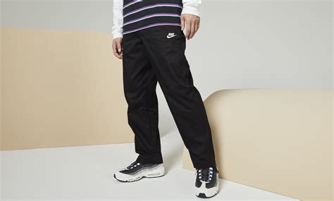 Nike Club Men's Woven Straight Leg Trousers. Nike IN