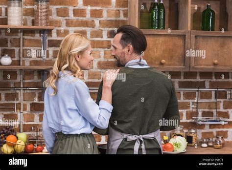 Wife hugging husband hi-res stock photography and images - Alamy