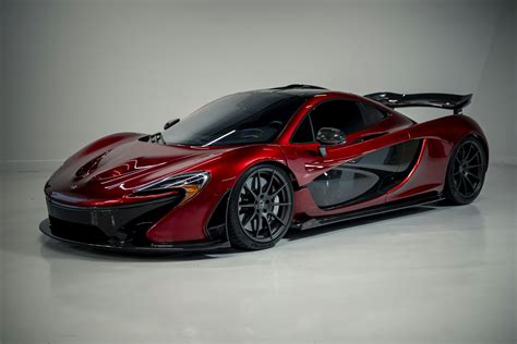 A shiny red mclaren p1 sports car. photo – Free Supercar Image on Unsplash