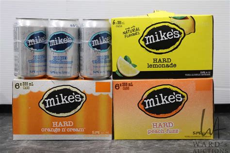 Four 6 packs of Mike's Hard Lemonade/ Peach Fuzz/ White Freeze/ Orange ...