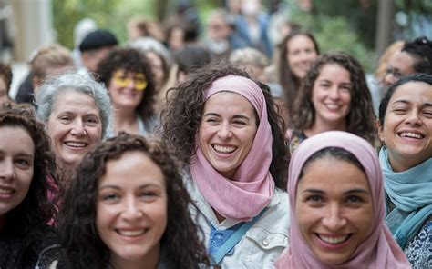 A group of women are smiling and smiling for the camera | Premium AI ...