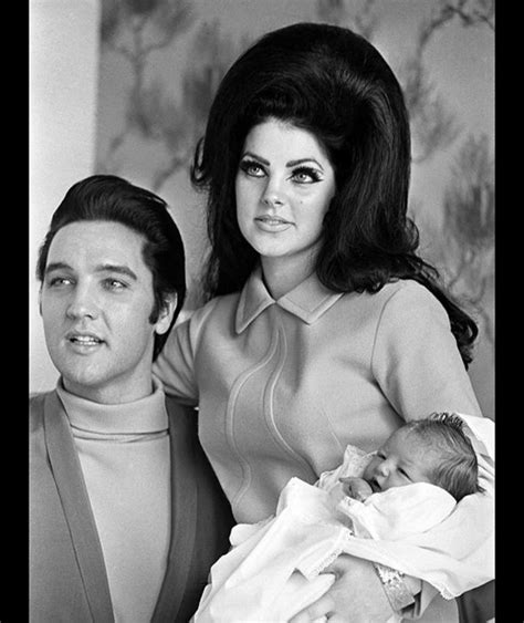 Elvis Presley with his wife Priscilla proudly show their new born baby ...