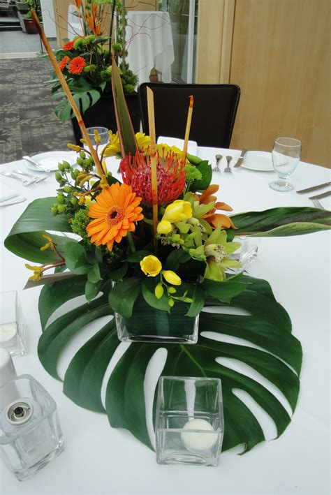 tropical floral centerpieces | Tropical wedding centerpieces, Greenery ...