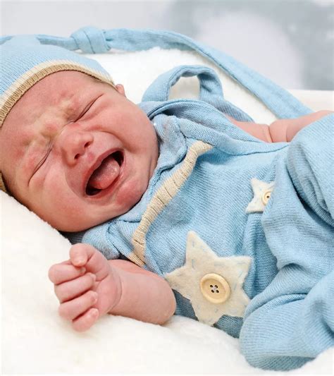 Baby Crying While Breastfeeding: 20 Causes & Soothing Tips