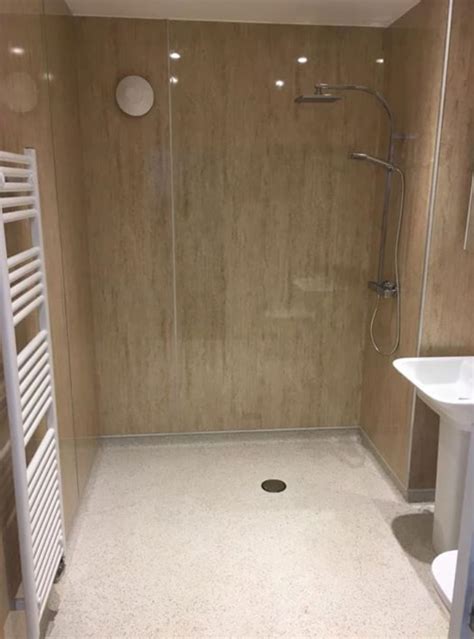 https://www.rwplumbinguk.co.uk/wp-content/uploads/2018/01/wet-room-walk-in-shower.jpg?utm_source=chatgpt.com