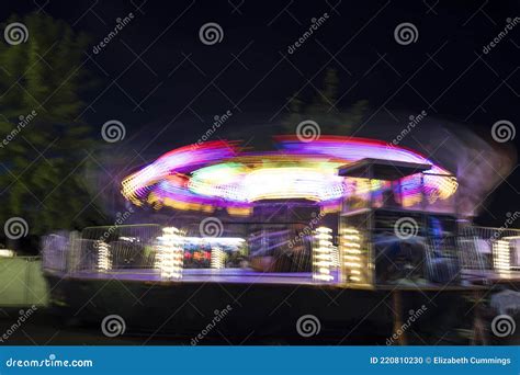 Our of Focus Long Exposure of a Spinning Carnival Ride in the Air Stock ...