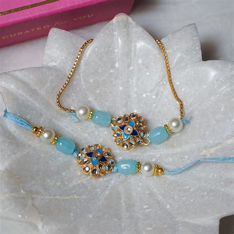 Buy Blossom Bliss Bhaiya Bhabhi Rakhi Online in India - Mypoojabox.in