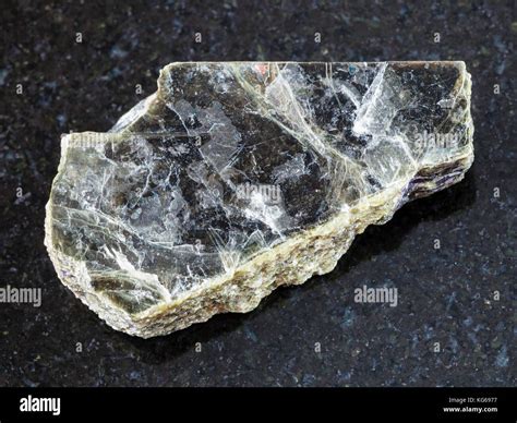 macro shooting of natural mineral rock specimen - raw muscovite mica ...