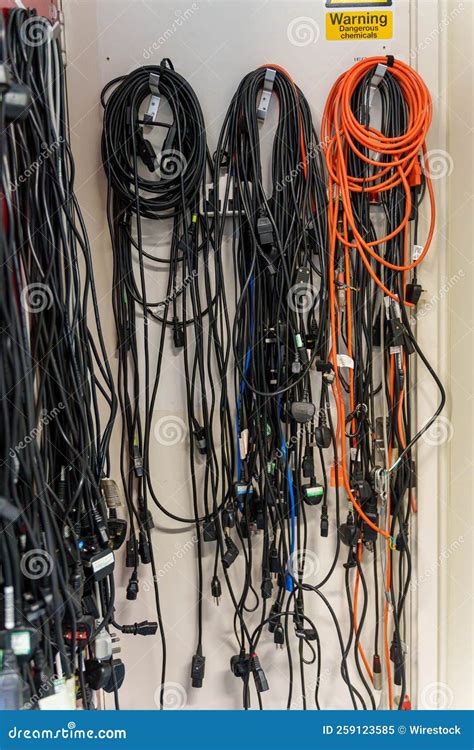 Vertical Shot of Audio and Video Cables Hanging Up on Hooks Stock Image ...