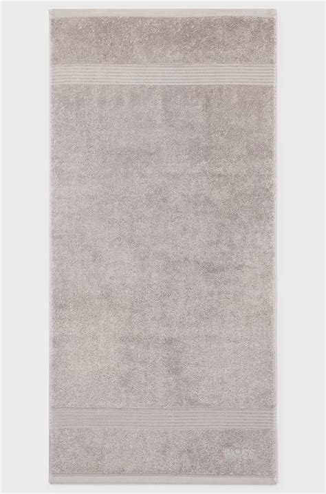 BOSS - Cotton hand towel in silver with embroidered logo - Silver