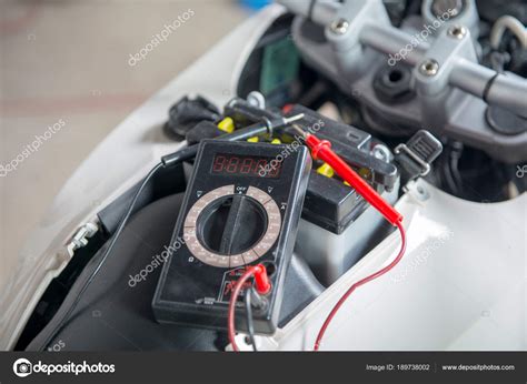 Image result for Using a Multimeter to Check Motorcycle Battery