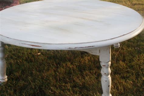 Making The Most Of A Distressed White Round Coffee Table - Coffee Table Decor
