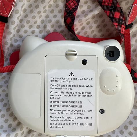 Hello Kitty Instax mini camera in cream and red... - Depop