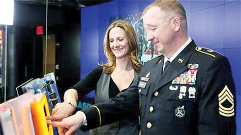 Fort Riley wounded warrior closes NASDAQ in New York | Article | The ...