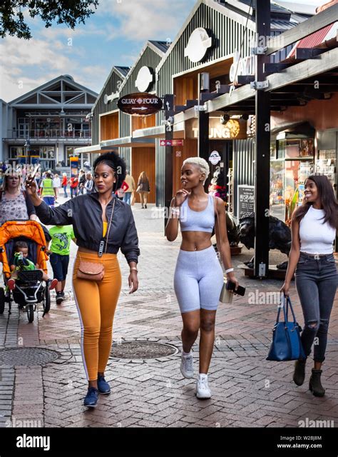 Cape Town, South Africa, 12th April - 2019: Girls taking a selfie of themselves at waterfront ...