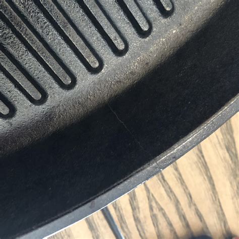Lodge grill pan arrived chipped on outside and cracked on both sides ...
