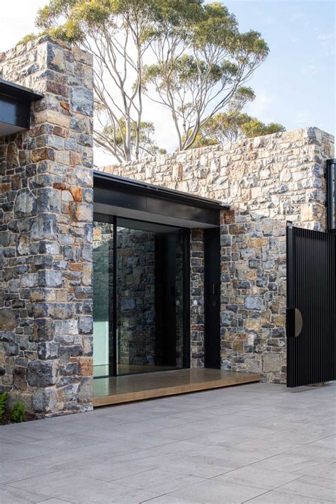 The Stone Walls Found Throughout This House Are Designed To Complement ...
