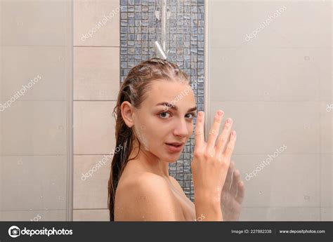 Beautiful Young Woman Taking Shower Home — Stock Photo © NewAfrica ...
