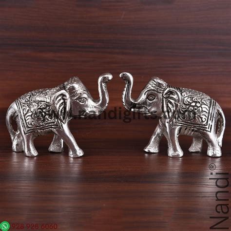 Whitemetal elephant statue pair mini – Nandi Gifts