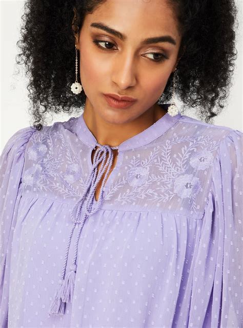 Buy Women Embroidered Tie-Up Neck Top Online at just Rs. 799.0 ...