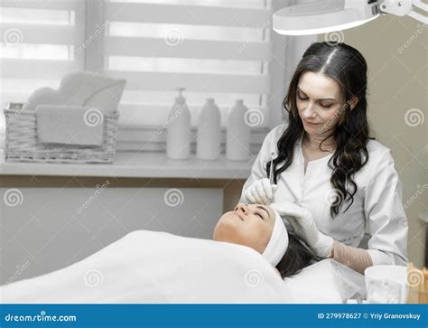 A Professional Procedure for Deep Cleansing of Facial Skin is Presented, Where the Cosmetologist ...