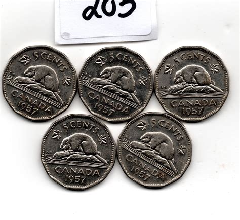 5 1957 BUGTAIL 5 CENT - Schmalz Auctions