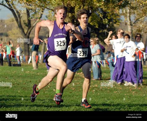 College Park's Brian Cameron strains to pass Michael Brondello at the ...