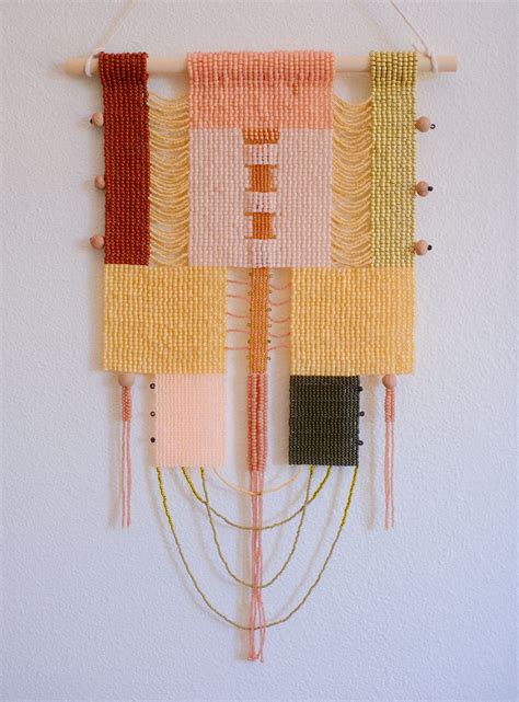 Ukaome | Weaving patterns design, Seed bead art, Beaded banners