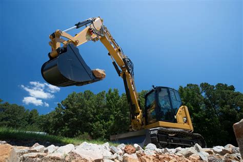 308 CR Mini Excavator with Variable Angle Boom | Cat | Caterpillar