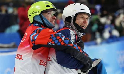 Beijing 2022 Winter Olympics: Ukrainian and Russian celebrate with hug