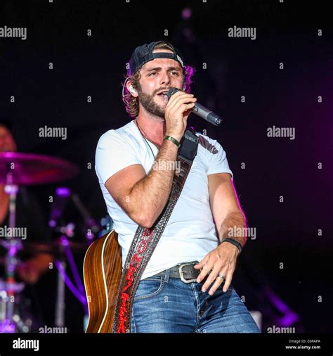 Raleigh, North Carolina, USA. 21st Aug, 2014. Music artist THOMAS RHETT ...