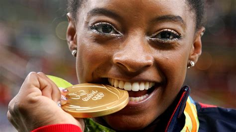 Why do Olympic athletes bite their medals? | wthr.com