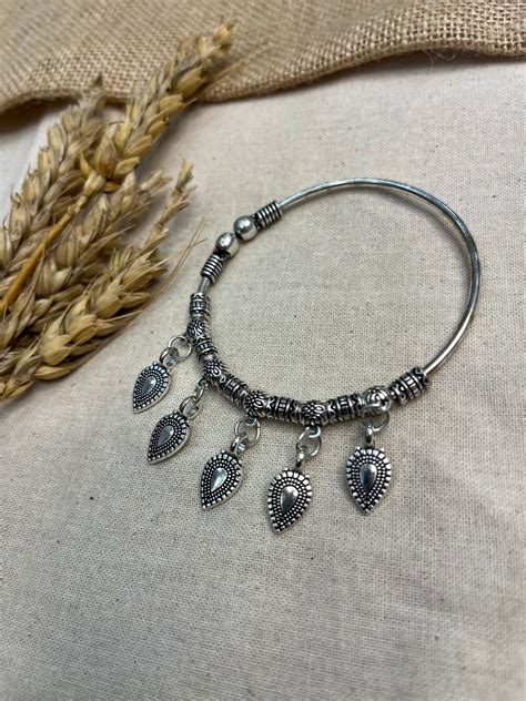 Tribal Charm Silver Bangle – WEVOW