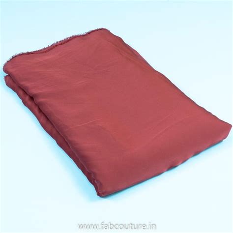 Premium Rust Marina Satin fabric Fabric for Designers | FabCouture