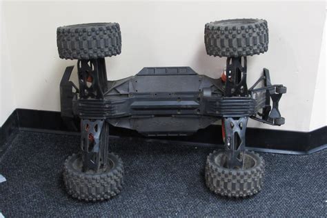 Traxxas X-Maxx Remote Control Monster Truck - Orange/Blue/Black Shell