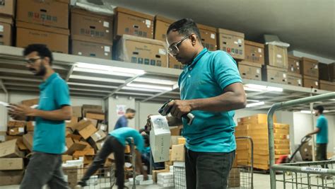 Warehouse worker scanning packages