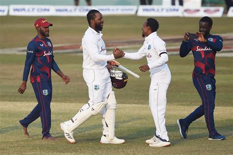 Kyle Mayers is congratulated by his team-mates after West Indies ...