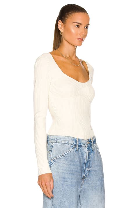 FRAME Ribbed Zip Long Sleeve Top in Bone | FWRD