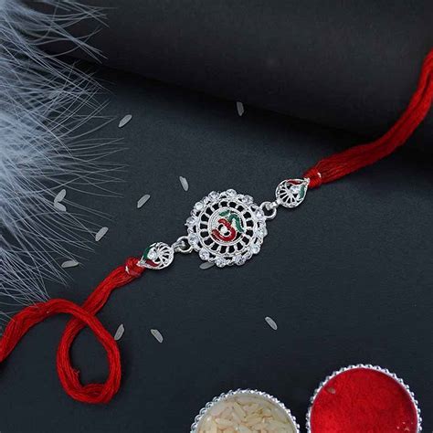 Send Silver Rakhi OM Online | Rakhibazaar.com