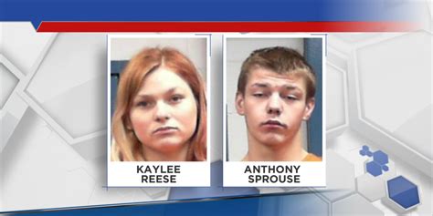 Police: Two charged with beating, dragging woman out of car