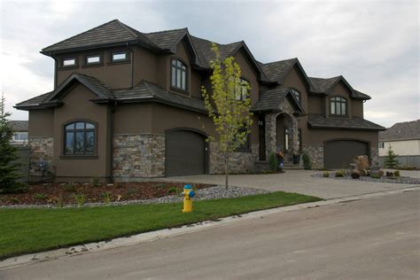 {not quite this dark} dark brown stucco homes | The Stucco & Stone work ...
