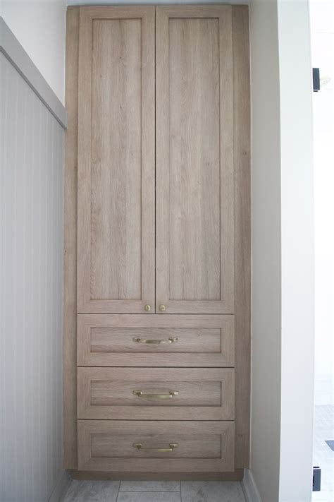 How To Diy A Built In Linen Cabinet The Playbook