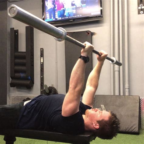 Skull Crushers Exercise Guide: How To, Form, and Tips - BarBend