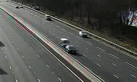 Moment van hit broken down car in fast lane of 'defective' smart ...
