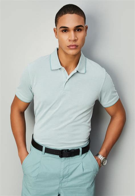 Buy Men Solid Slim Fit Polo T-shirt Online at just Rs. 599.0 ...