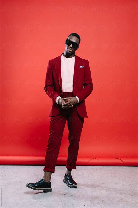 Black Man Standing In Suit