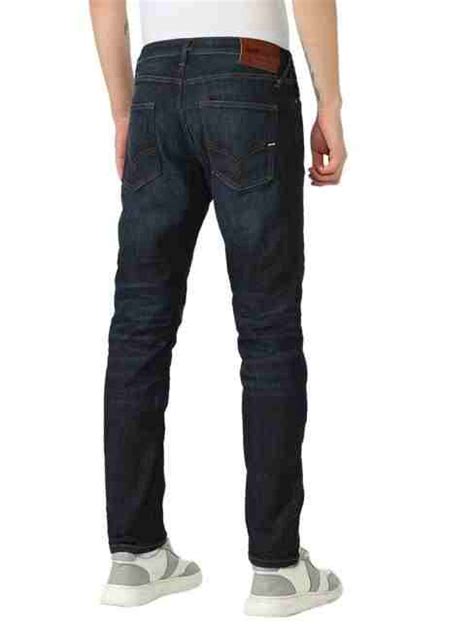 Carrot Fit Mid Rise Denim