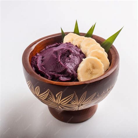 A bowl of Acai ice cream with bananas and a banana leaf | Premium AI ...