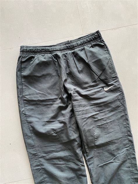 NIKE BAGGY TRACK PANT - – Aged Arc